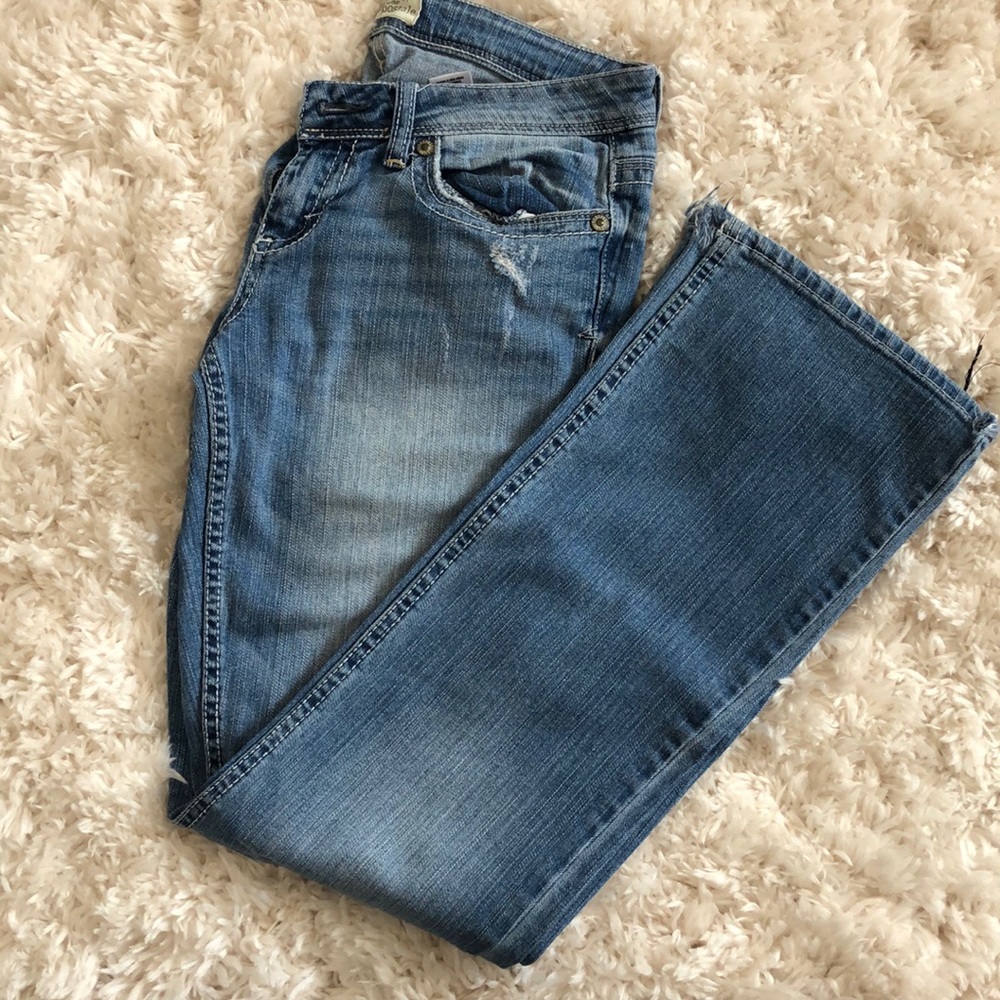 Boot cut distressed jeans